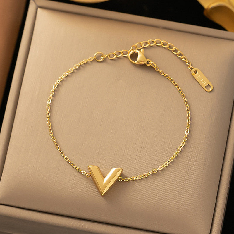 Jewels Galaxy Gold Plated Stainless Steel Anti Tarnish V-Shaped Wraparound Bracelet For Women