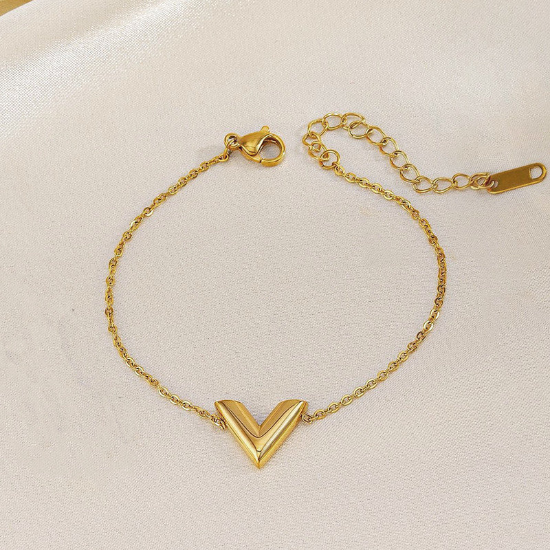 Jewels Galaxy Gold Plated Stainless Steel Anti Tarnish V-Shaped Wraparound Bracelet For Women