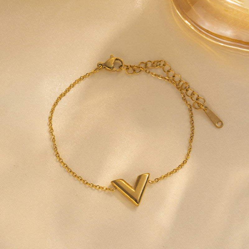 Jewels Galaxy Gold Plated Stainless Steel Anti Tarnish V-Shaped Wraparound Bracelet For Women