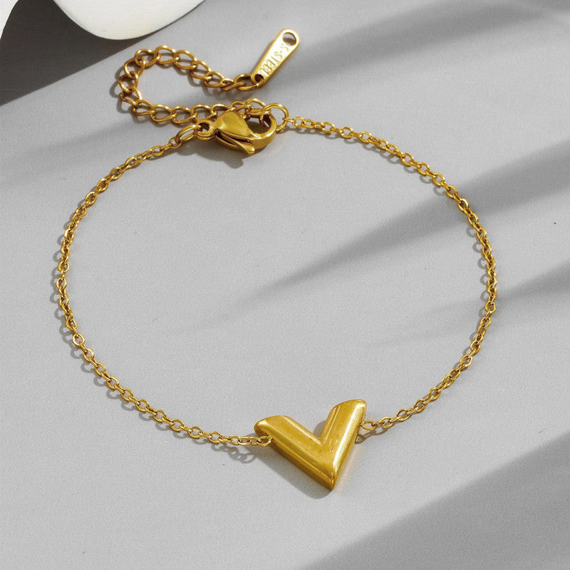Jewels Galaxy Gold Plated Stainless Steel Anti Tarnish V-Shaped Wraparound Bracelet For Women