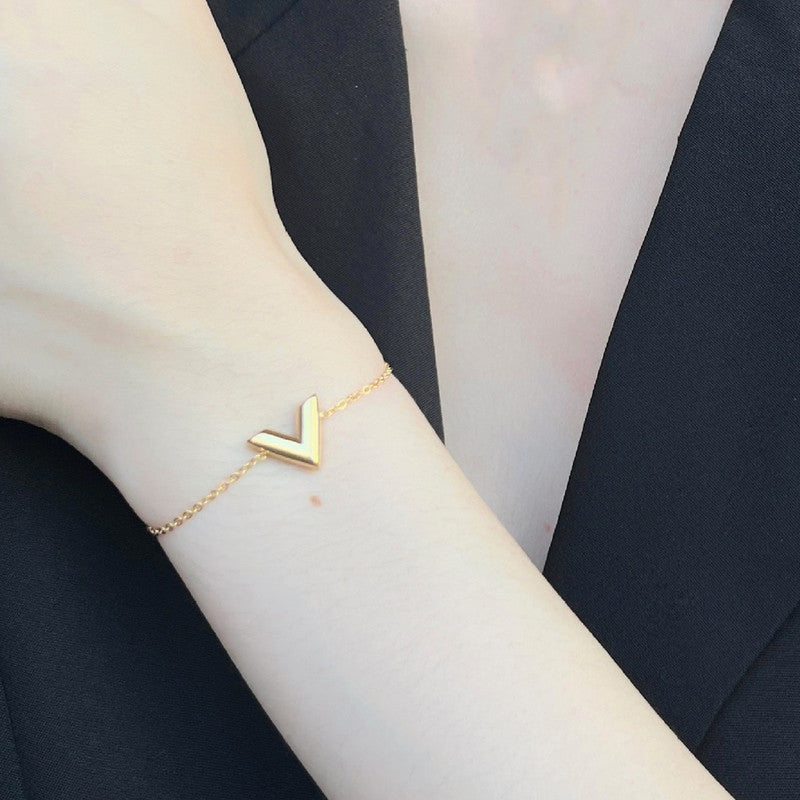 Jewels Galaxy Gold Plated Stainless Steel Anti Tarnish V-Shaped Wraparound Bracelet For Women
