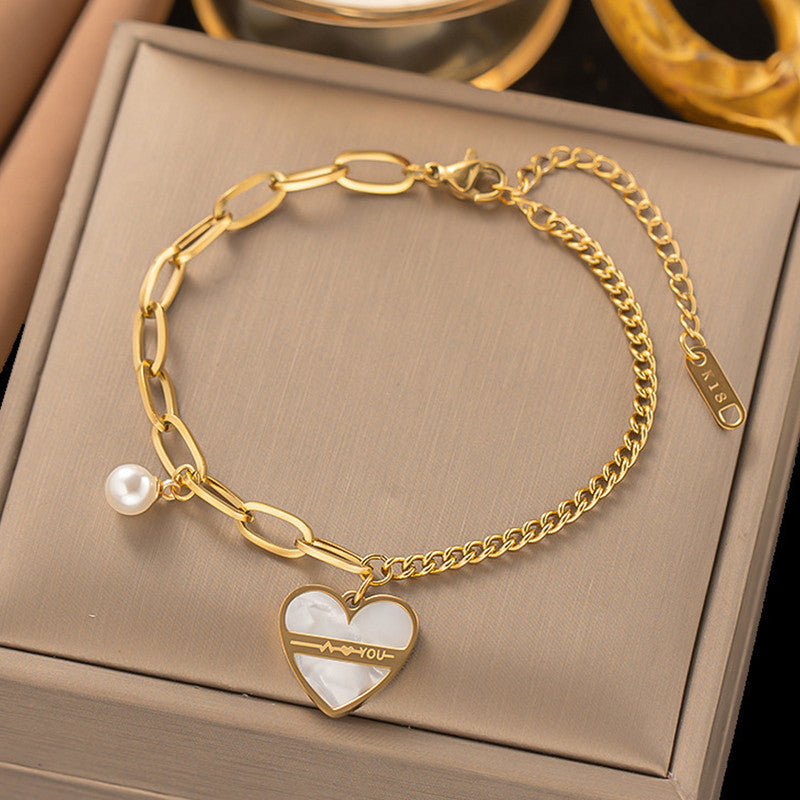 Jewels Galaxy Gold Plated Stainless Steel Anti Tarnish Heart themed Wraparound Bracelet For Women