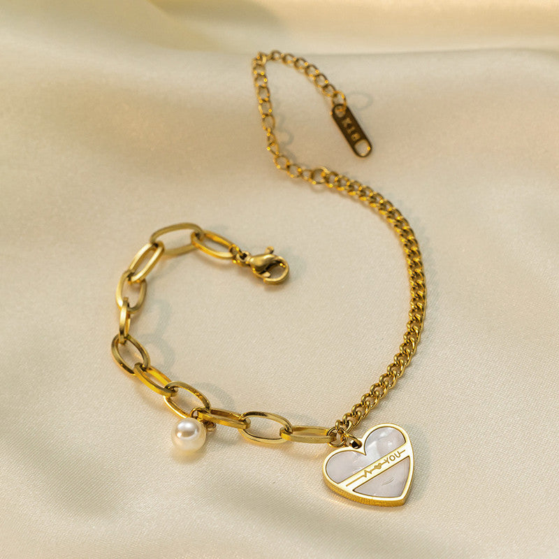 Jewels Galaxy Gold Plated Stainless Steel Anti Tarnish Heart themed Wraparound Bracelet For Women