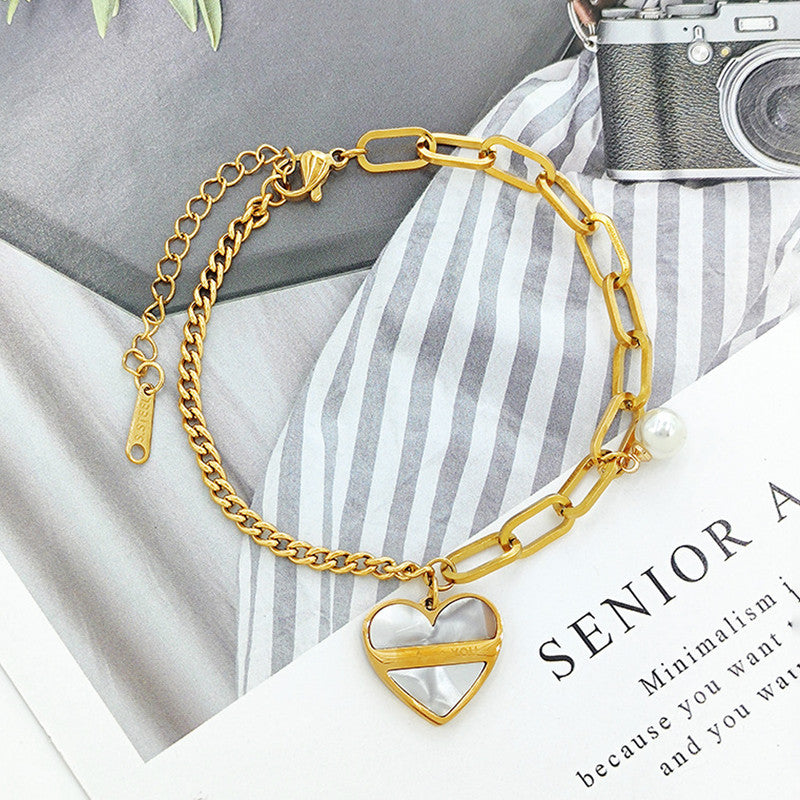 Jewels Galaxy Gold Plated Stainless Steel Anti Tarnish Heart themed Wraparound Bracelet For Women