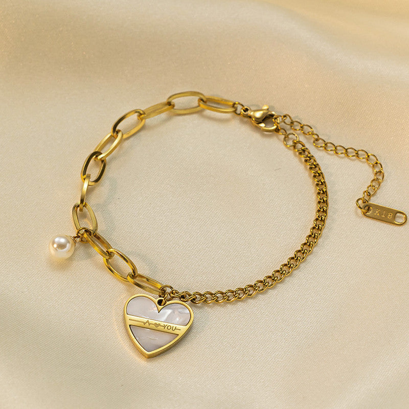 Jewels Galaxy Gold Plated Stainless Steel Anti Tarnish Heart themed Wraparound Bracelet For Women