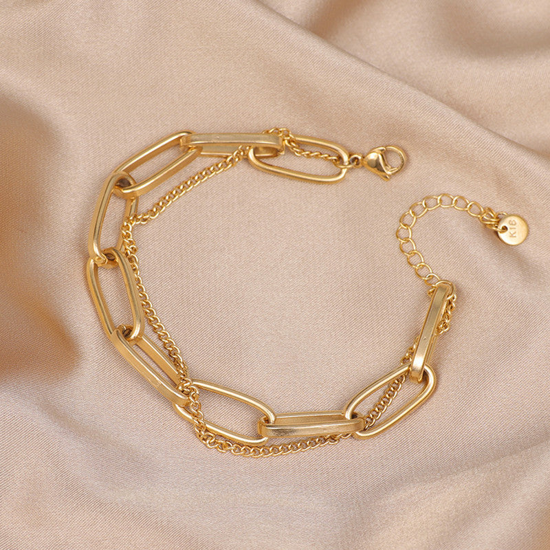 Jewels Galaxy Gold Plated Stainless Steel Anti Tarnish Rope Design Wraparound Bracelet For Women