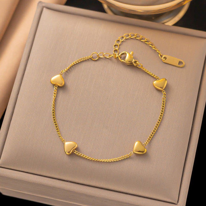 Jewels Galaxy Gold Plated Stainless Steel Anti Tarnish Heart themed Wraparound Bracelet For Women