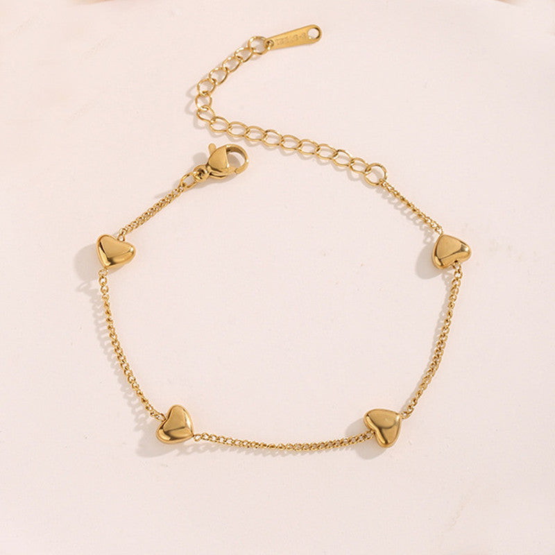 Jewels Galaxy Gold Plated Stainless Steel Anti Tarnish Heart themed Wraparound Bracelet For Women