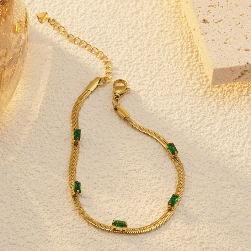 Jewels Galaxy Gold Plated Stainless Steel Anti Tarnish Snake Chain Green Emerald Studded Bracelet