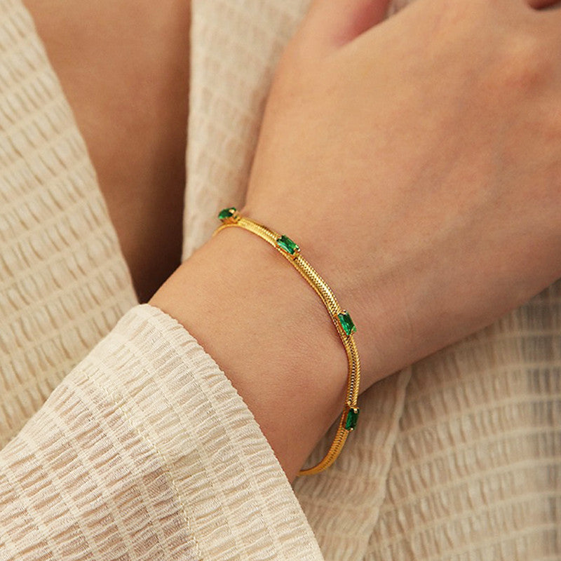 Jewels Galaxy Gold Plated Stainless Steel Anti Tarnish Snake Chain Green Emerald Studded Bracelet
