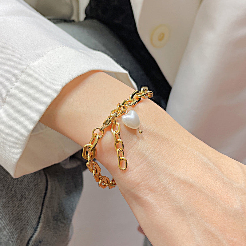 Jewels Galaxy Gold Plated Anti Tarnish Stainless Steel Pearl Studded Wraparound Bracelet