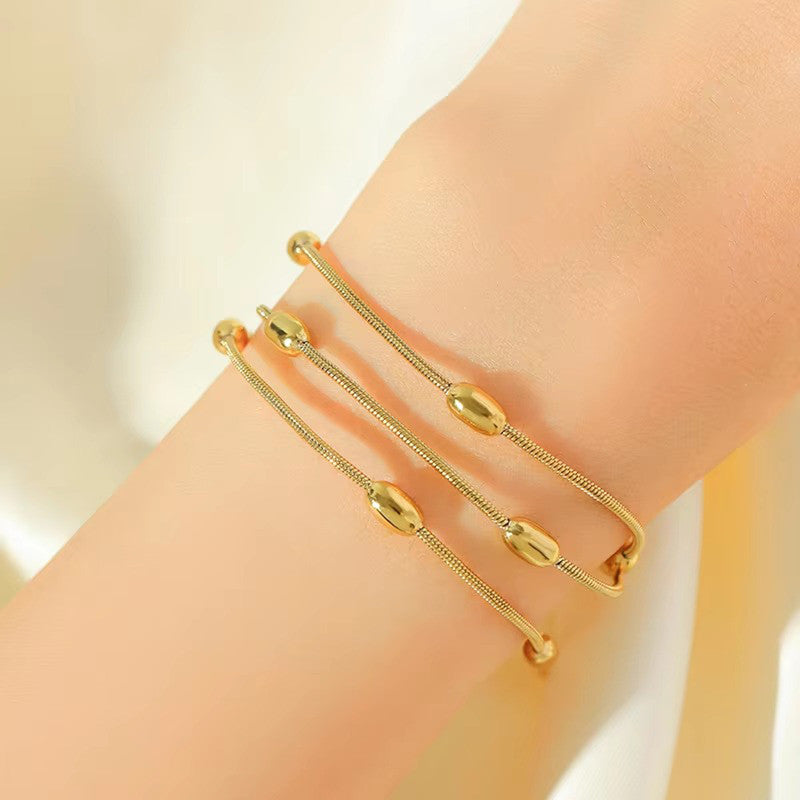 Jewels Galaxy Gold Plated Anti Tarnish Stainless Steel Triple Strand Necklace Bracelet cum Necklace