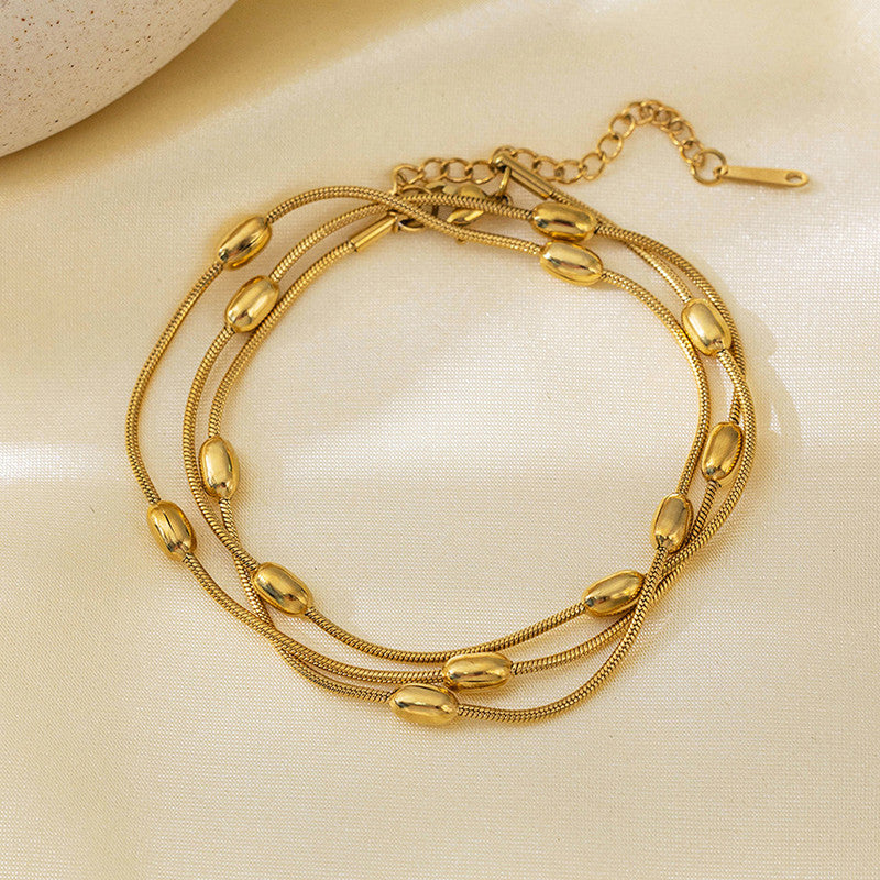 Jewels Galaxy Gold Plated Anti Tarnish Stainless Steel Triple Strand Necklace Bracelet cum Necklace