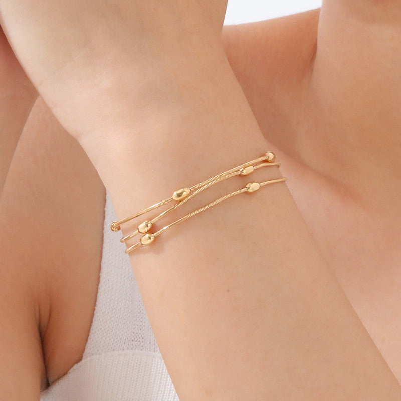 Jewels Galaxy Gold Plated Anti Tarnish Stainless Steel Triple Strand Necklace Bracelet cum Necklace
