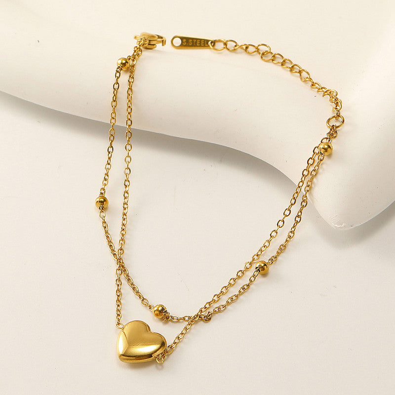 Jewels Galaxy Gold Plated Anti Tarnish Stainless Steel Heart Themed Wraparound Bracelet