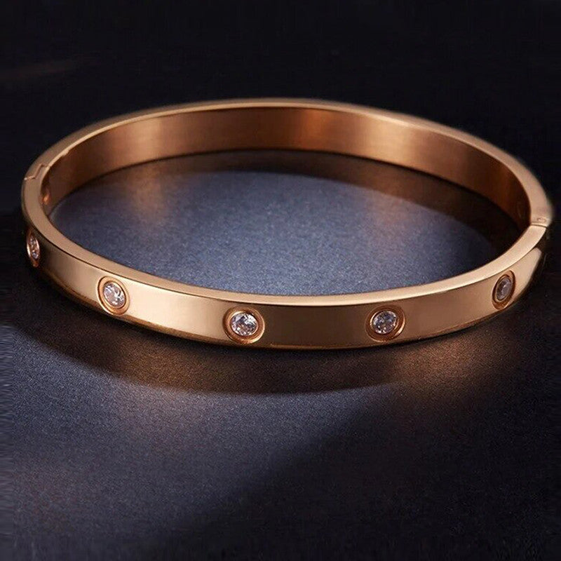 Jewels Galaxy Stainless Steel Contemporary Rose Gold Plated Love AD Bracelet For Women