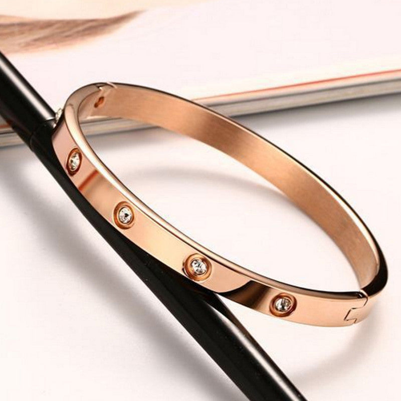 Jewels Galaxy Stainless Steel Contemporary Rose Gold Plated Love AD Bracelet For Women