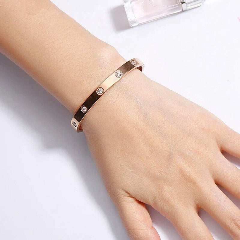 Jewels Galaxy Stainless Steel Contemporary Rose Gold Plated Love AD Bracelet For Women