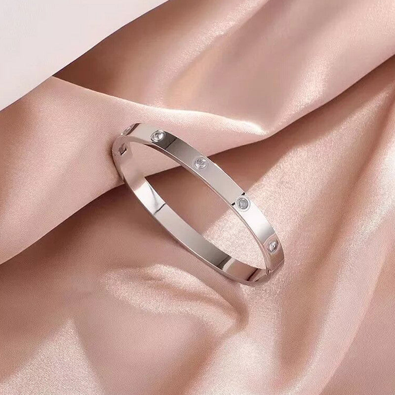 Jewels Galaxy Stainless Steel Contemporary Silver Plated Love AD Anti-Tarnish Bracelet For Women