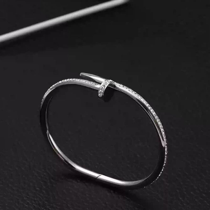 Jewels Galaxy Stainless Steel Anti Tarnish AD Studded Nail Bracelet For Women