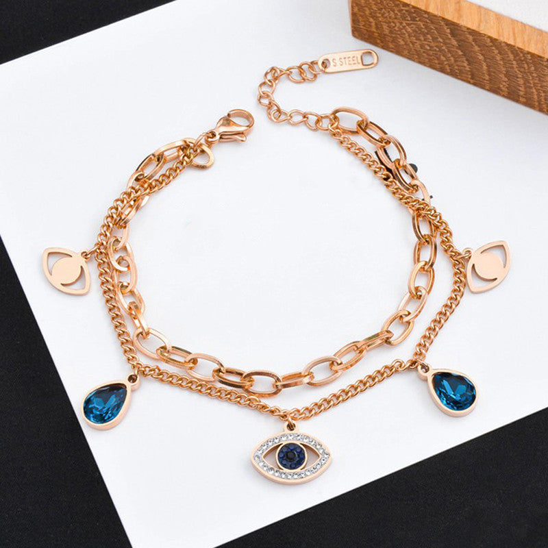 Jewels Galaxy Stainless Steel Anti Tarnish Crystal Studded Evil Eye Bracelet For Women