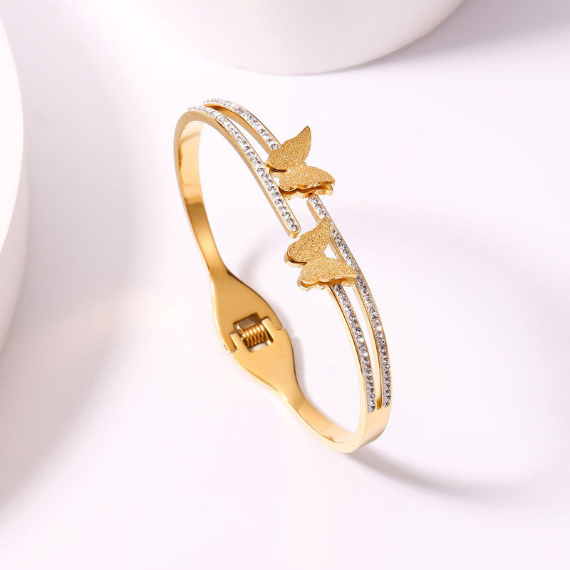 Jewels Galaxy Stainless Steel Butterfly AD Studded Anti-Tarnish Bracelet For Women