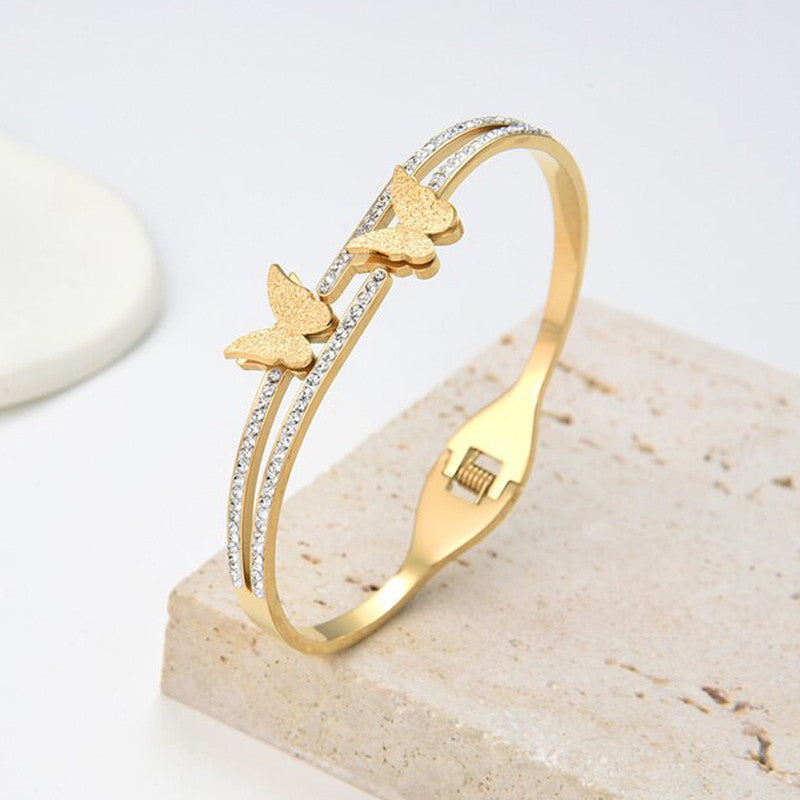 Jewels Galaxy Stainless Steel Butterfly AD Studded Anti-Tarnish Bracelet For Women