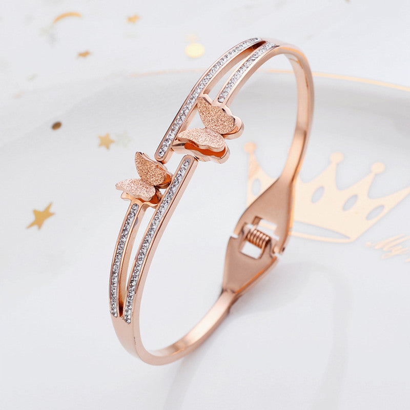 Jewels Galaxy Stainless Steel Butterfly AD Studded Anti-Tarnish Bracelet For Women