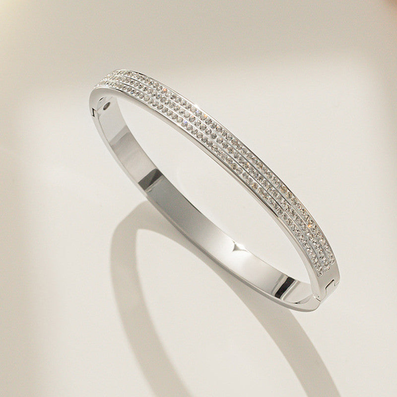 Jewels Galaxy Stainless Steel Triple Lines AD Contemporary Anti-Tarnish Bracelet For Women
