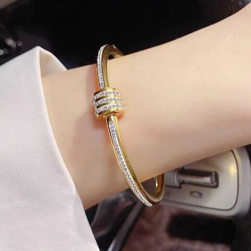 Jewels Galaxy Stainless Steel AD Studded Bangle Style Anti-Tarnish Bracelet For Women