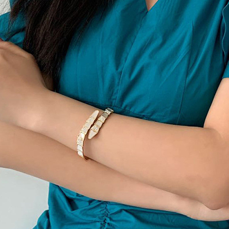 Jewels Galaxy Stainless Steel Mother of Pearl Snake Styled AD Studded Anti-Tarnish Bracelet