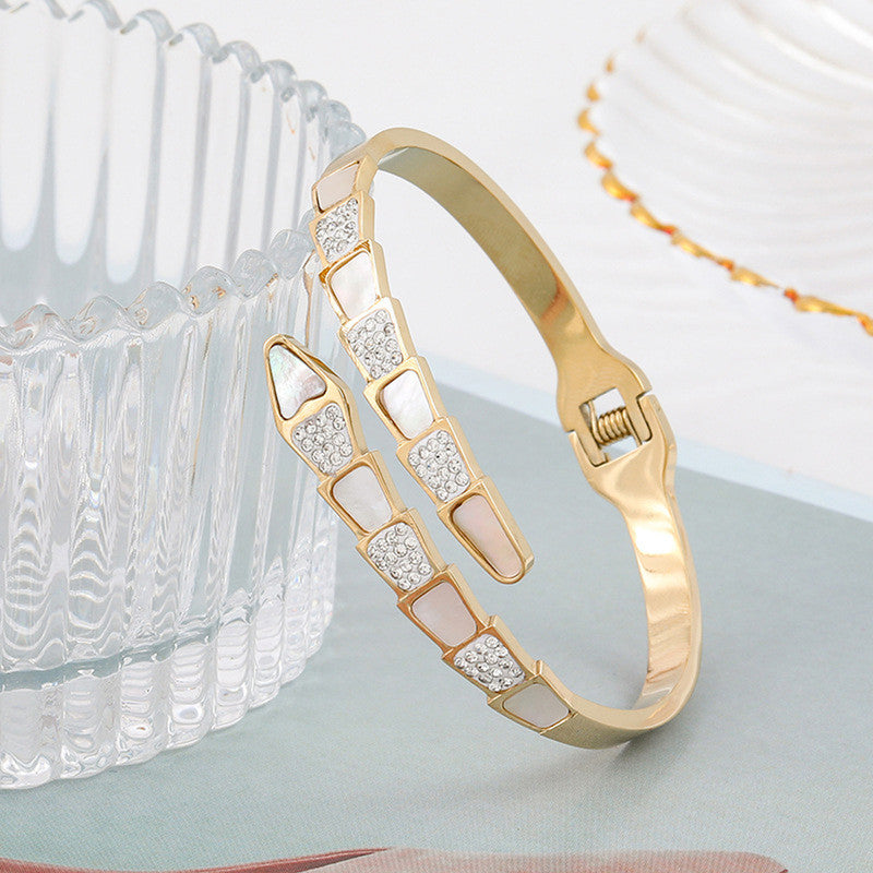 Jewels Galaxy Stainless Steel Mother of Pearl Snake Styled AD Studded Anti-Tarnish Bracelet