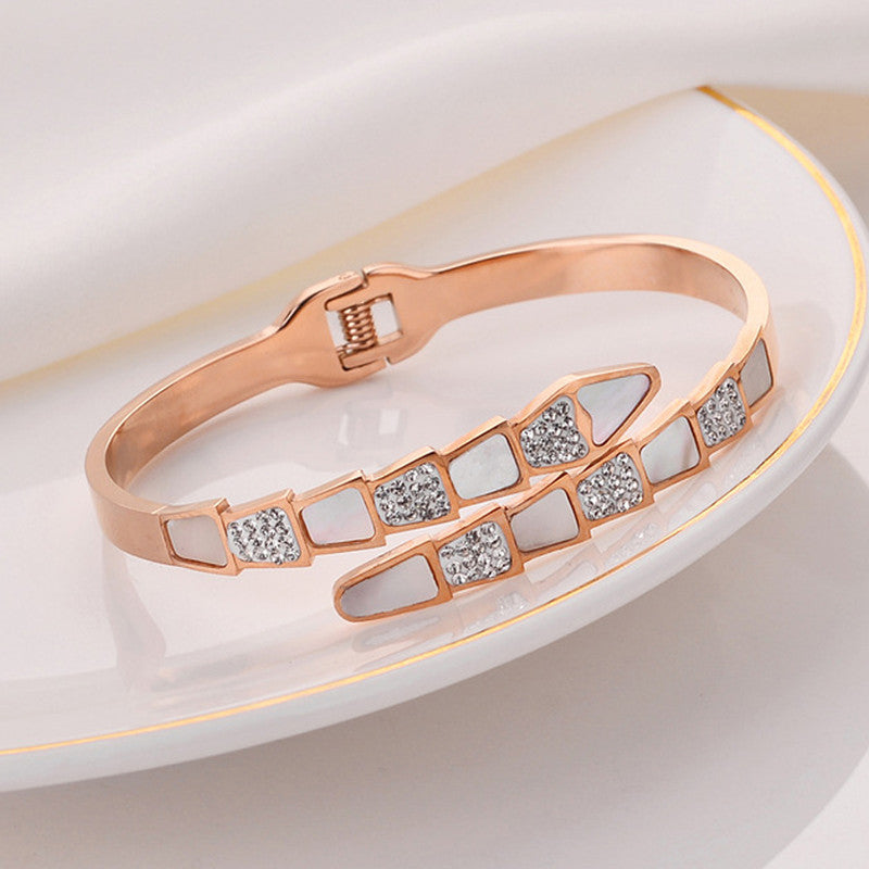 Jewels Galaxy Stainless Steel Mother of Pearl Snake Styled AD Studded Anti-Tarnish Bracelet