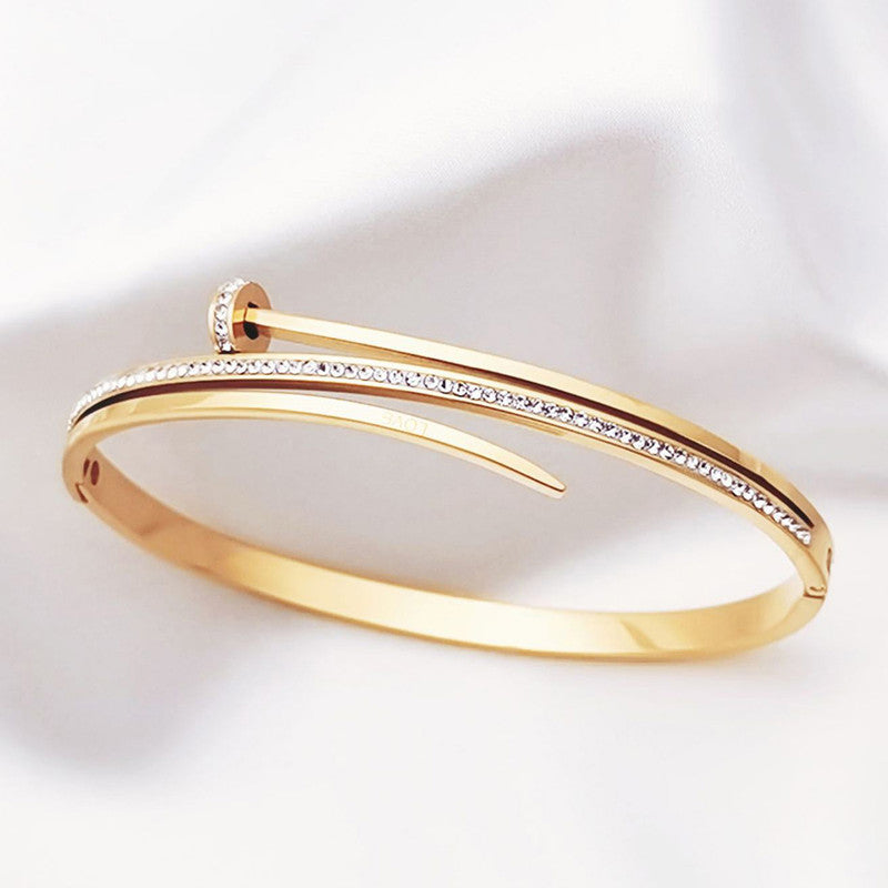 Jewels Galaxy Stainless Steel American Diamond Studded Nail Anti-Tarnish Bracelet For Women