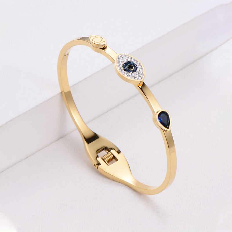 Jewels Galaxy Stainless Steel AD Evil Eye Bangle-Style Anti-Tarnish Bracelet For Women
