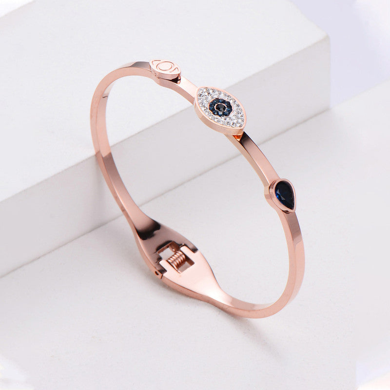 Jewels Galaxy Stainless Steel AD Evil Eye Bangle-Style Anti-Tarnish Bracelet For Women