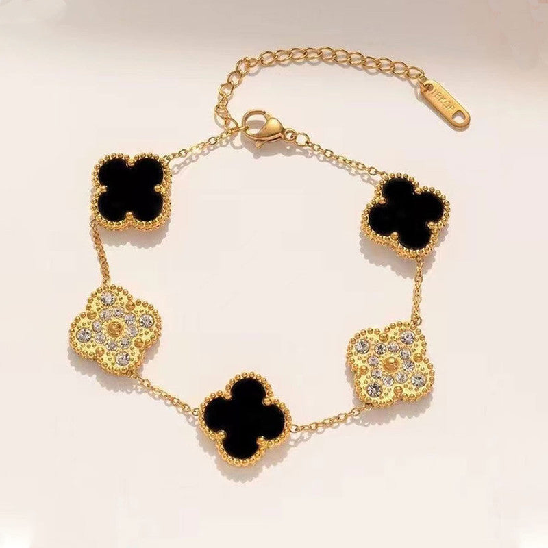 Jewels Galaxy Stainless Steel Gold-Plated Multicolor AD studded Clover Link Bracelet For Women