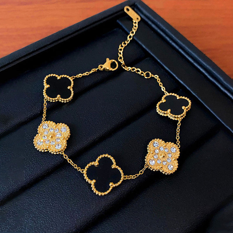 Jewels Galaxy Stainless Steel Gold-Plated Multicolor AD studded Clover Link Bracelet For Women
