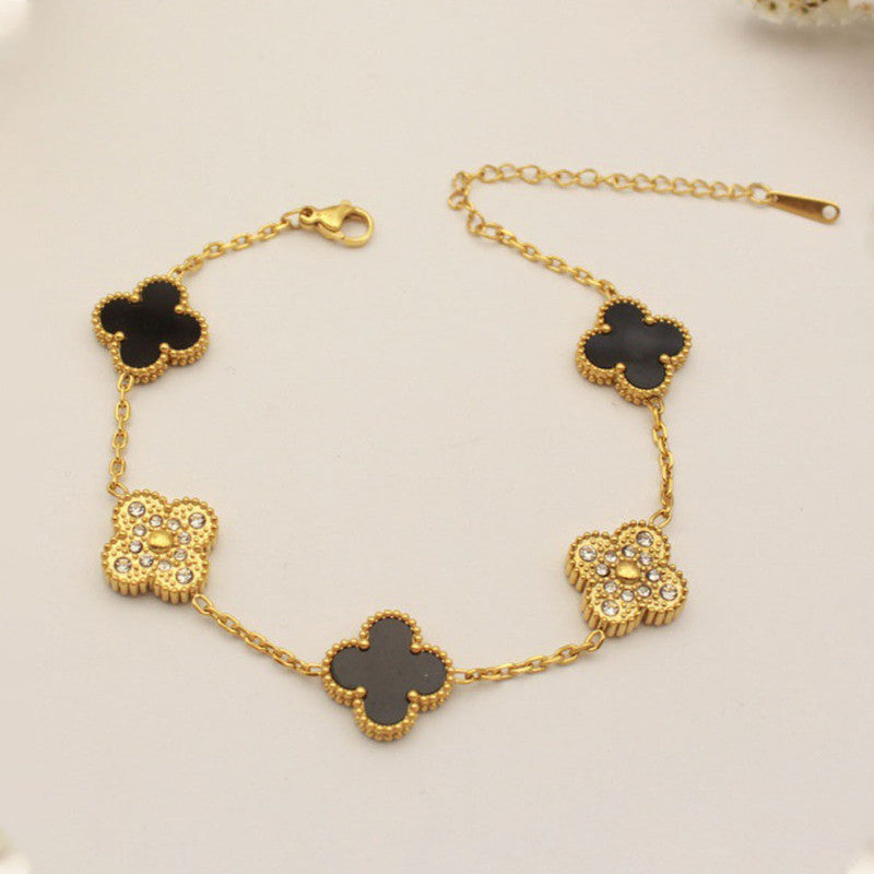 Jewels Galaxy Stainless Steel Gold-Plated Multicolor AD studded Clover Link Bracelet For Women