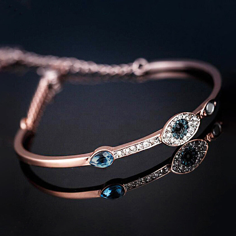Jewels Galaxy Stainless Steel Anti-Tarnish AD Evil Eye Bangle-Style Bracelet For Women