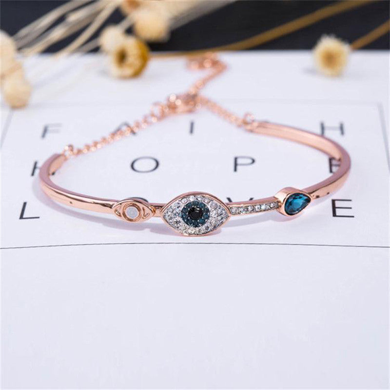 Jewels Galaxy Stainless Steel Anti-Tarnish AD Evil Eye Bangle-Style Bracelet For Women