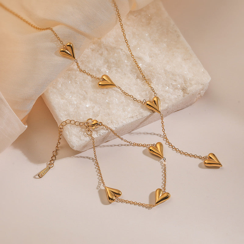 Jewels Galaxy Gold-Plated Anti Tarnish Heart Themed Jewellery Set