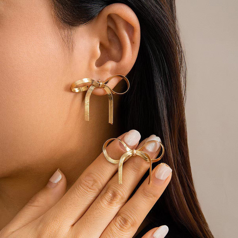 Jewels Galaxy Gold Plated Anti Tarnish Bow Themed Drop Earrings