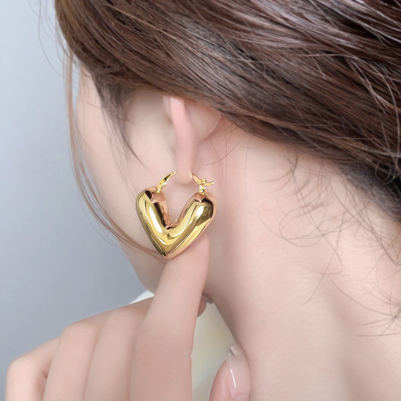 Jewels Galaxy Gold Plated Anti Tarnish Heart Themed Earrings