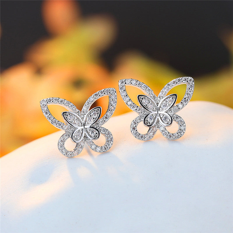 Jewels Galaxy American Diamond Studded Dual Butterfly Shaped Korean Stud Earrings