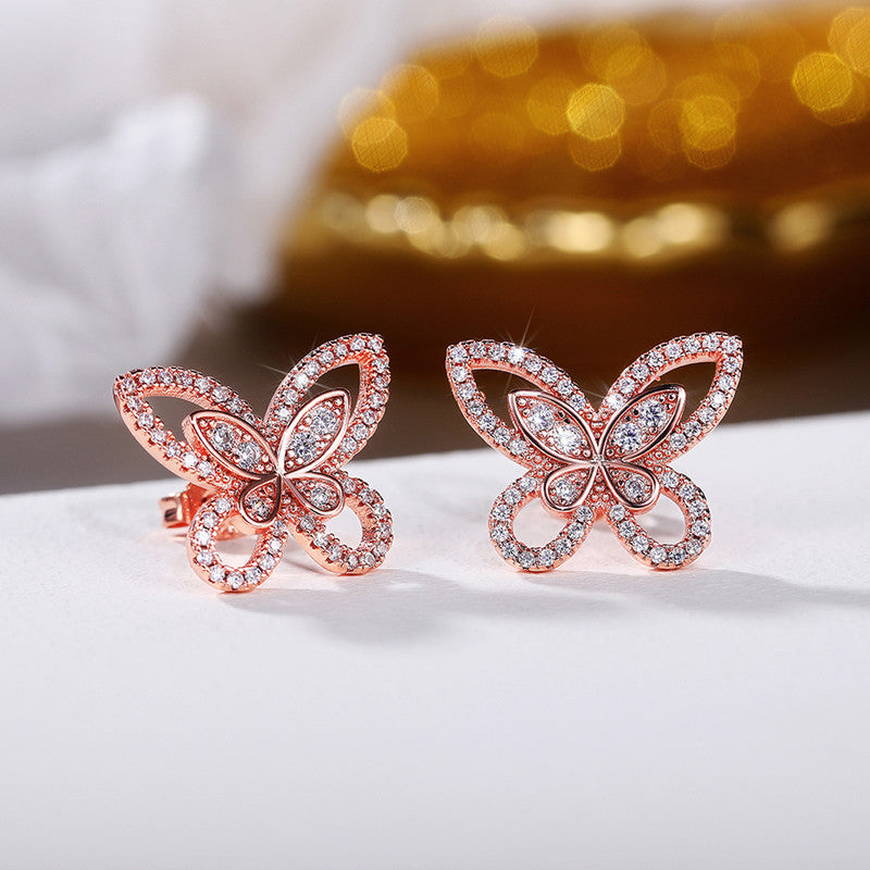 Jewels Galaxy American Diamond Studded Dual Butterfly Shaped Korean Stud Earrings