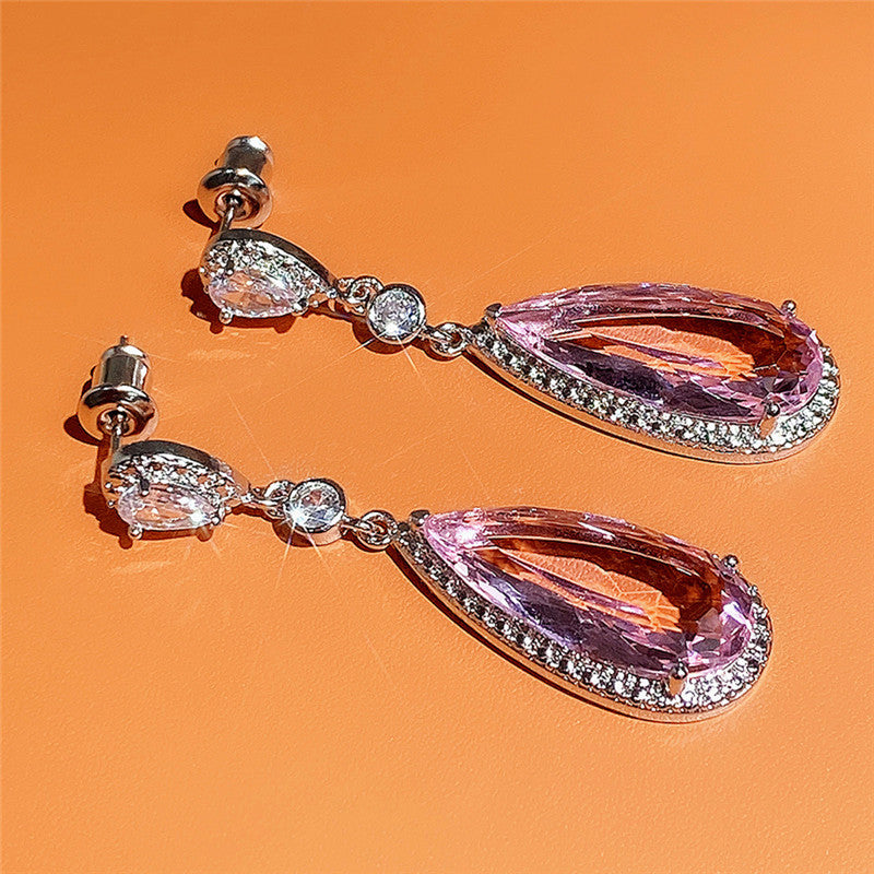 Jewels Galaxy Silver Plated American Diamond Studded Pink Teardop Shape Ice Cut Drop Earrings