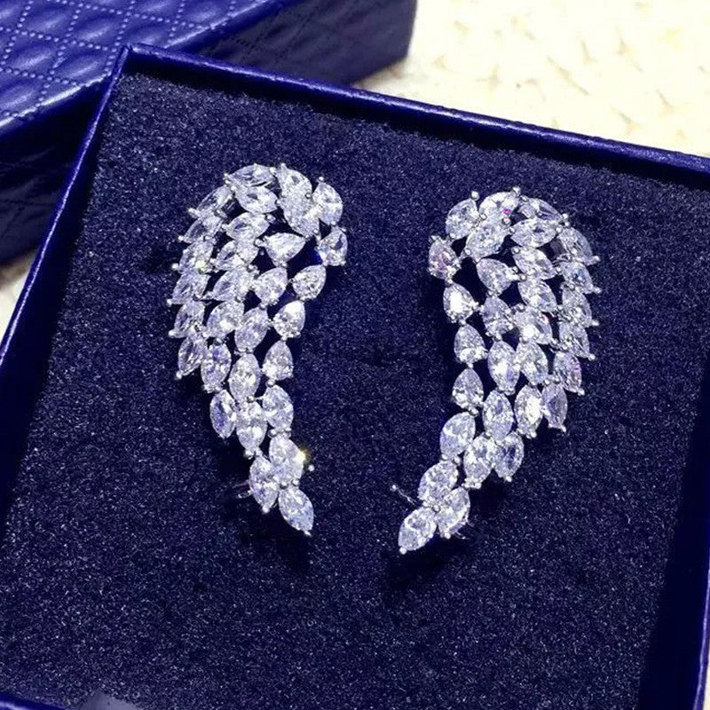 Jewels Galaxy Silver Plated American Diamond Studded Pink Teardop Shape Ice Cut Drop Earrings