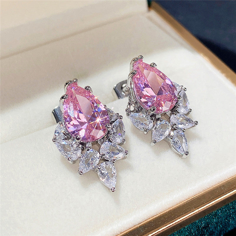 Jewels Galaxy Silver Plated American Diamond Studded Crushed Ice Cut Drop Earrings