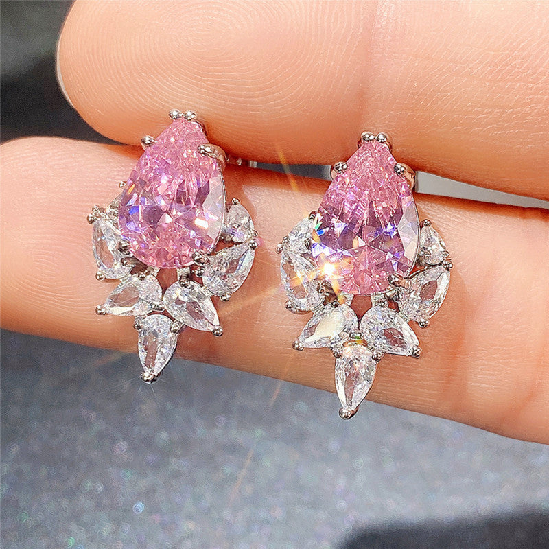 Jewels Galaxy Silver Plated American Diamond Studded Crushed Ice Cut Drop Earrings
